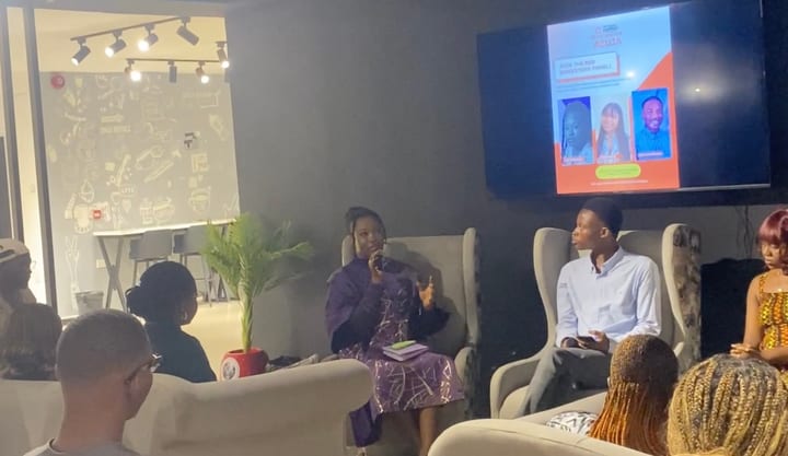 Jasmine-Jade on the FCDC Meetup Abuja panel, venue and audience in view